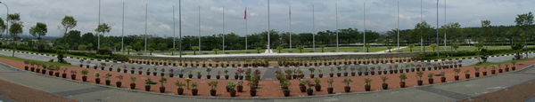 Rows of flower pots in front of administration building of Aimst University